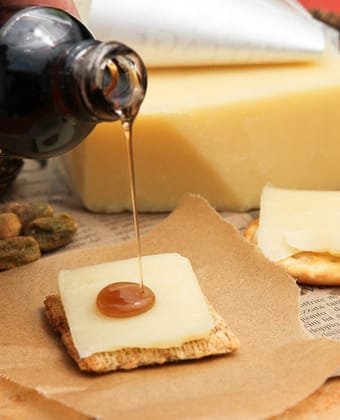Cheese and maple syrup by Runamok Maple