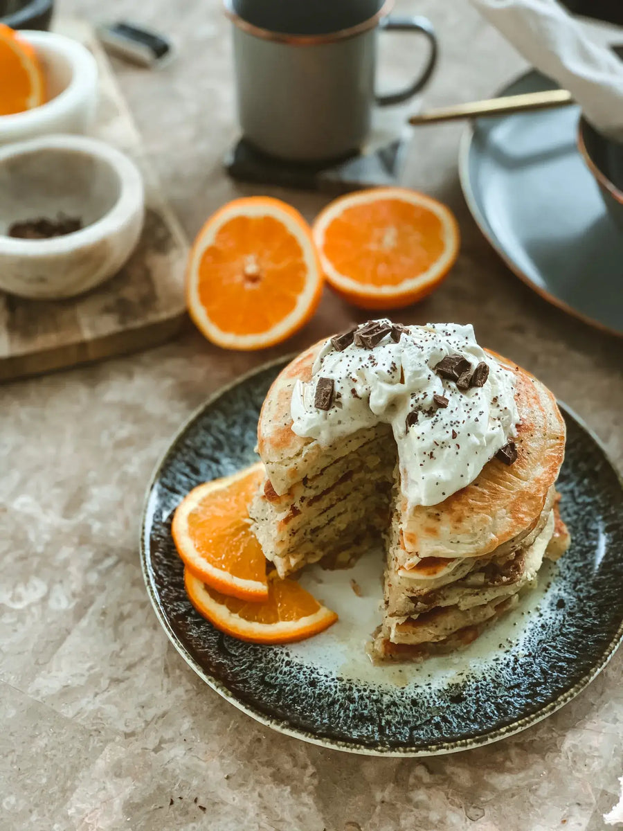 Orange Poppyseed Pancakes with Whipped Ricotta & Maple Syrup