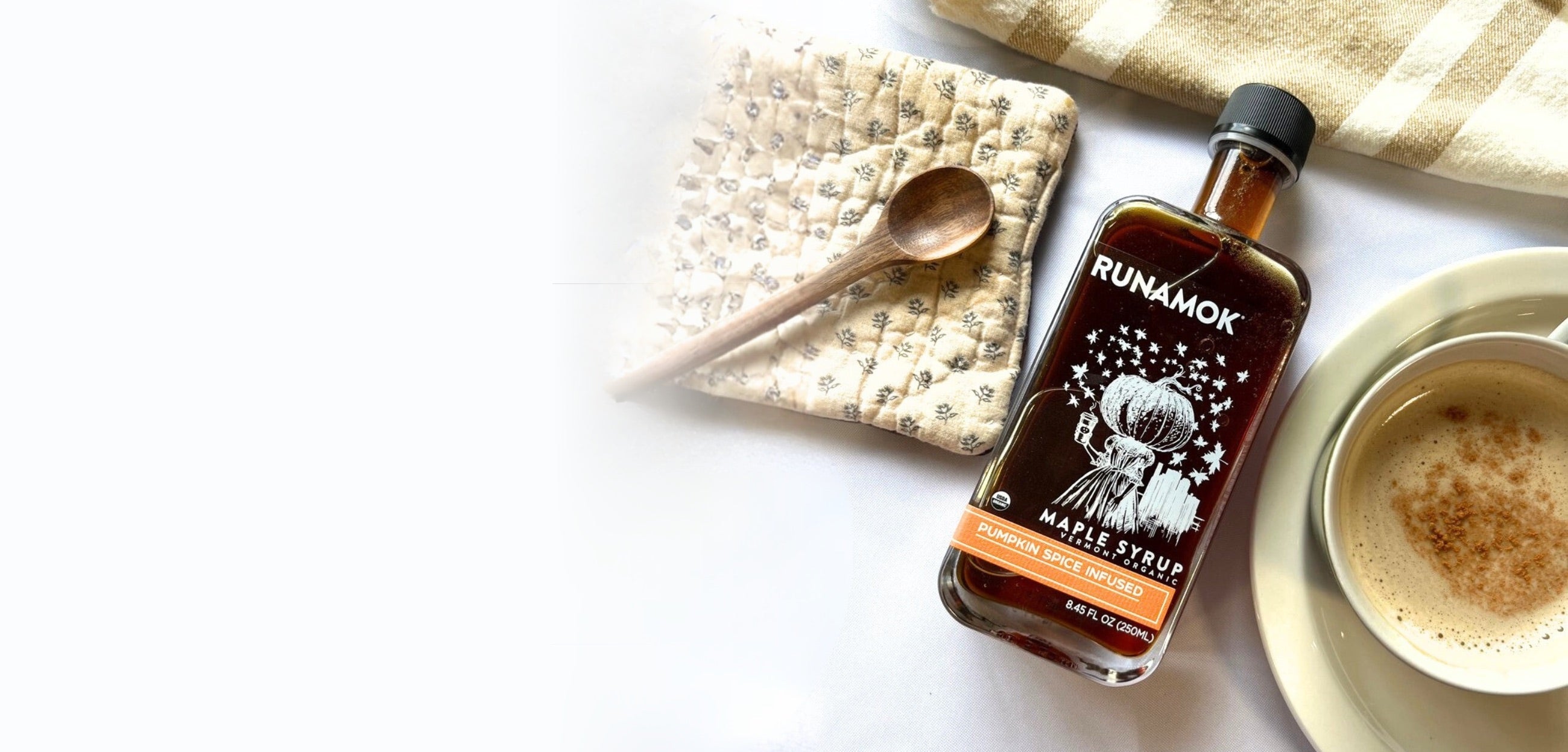 Pumpkin Spice Infused Maple Syrup with a latte