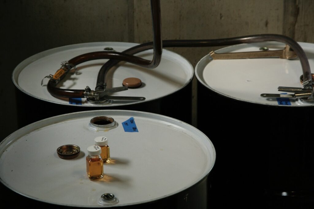 maple barrels with sample grading jard